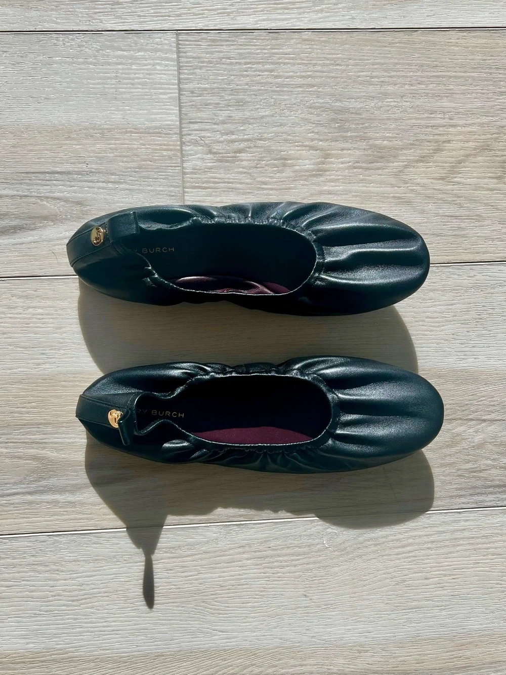 Tory Burch “Eddie” Black Ballet Flats with Gold Logo Button